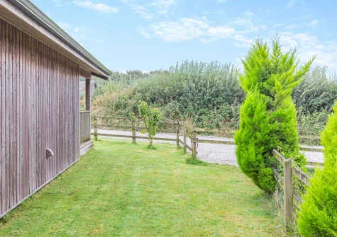 The lawned garden at Snowy Owl, Winnard's Perch