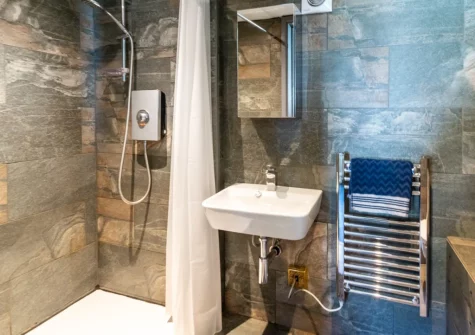 The shower room at Someplace Else, St Day