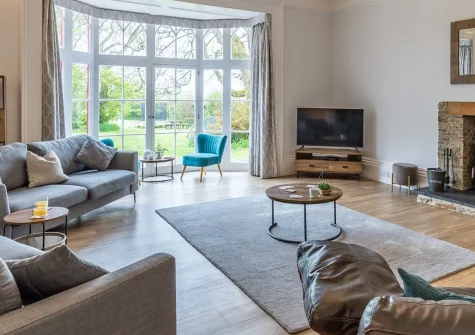 South Blatchborough Manor, Bradworthy is a wonderful 1822 character manor. Five bedrooms, expansive gardens with entertainment, countryside views, and excellent access to Devon and Cornwall attractions. Perfect for families seeking memorable breaks.