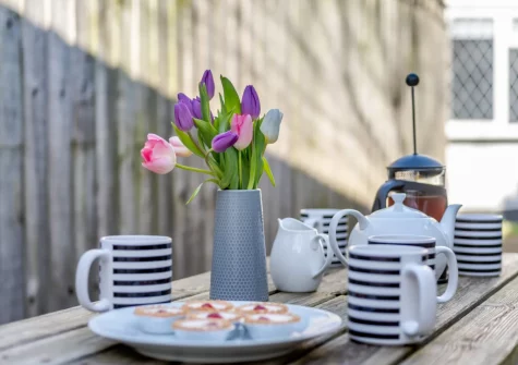 The enclosed courtyard garden & alfresco dining area at South Street Farm, Braunton