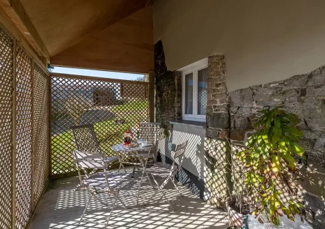 The veranda & outdoor sitting area at South Woodford, Milton Damerel