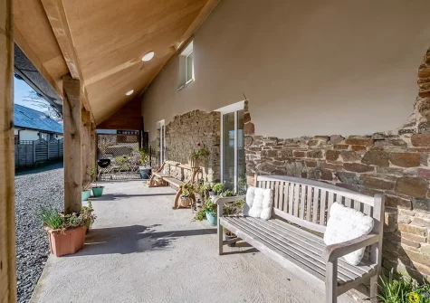 The veranda & outdoor sitting area at South Woodford, Milton Damerel
