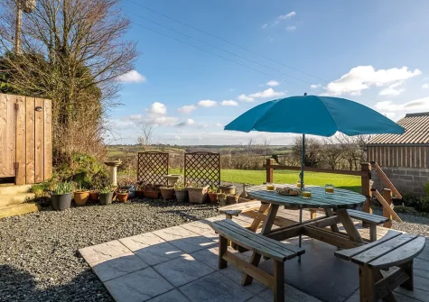 The patio, barbecue & alfresco dining area at South Woodford, Milton Damerel