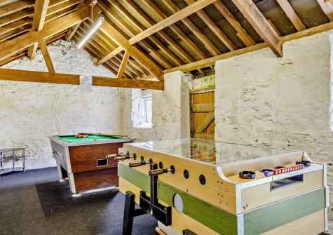 The games room, in the adjacent barn, at Sowanna Farm Cottage, White Cross