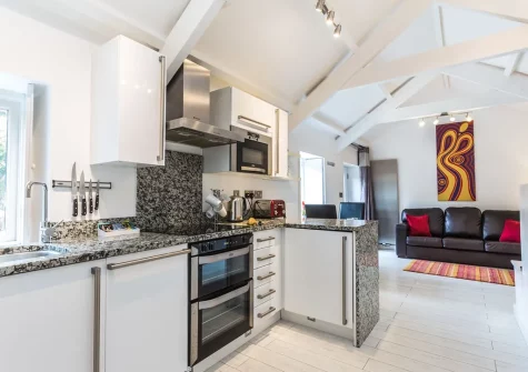 The kitchen & living area at Spice Barn, Old Lanwarnick Cottages, Trefanny Hill