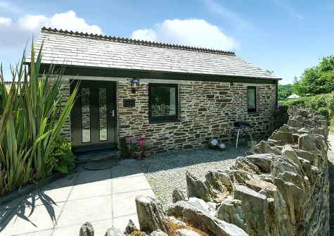 The patio & barbecue area at Spice Barn, Old Lanwarnick Cottages, Trefanny Hill