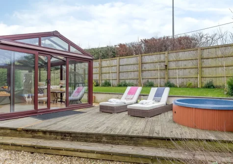 The conservatory, decked patio & hot tub at Spindrift, Instow