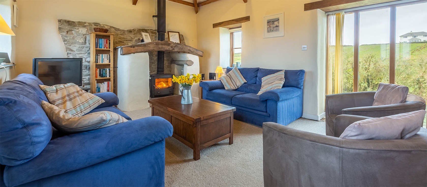 Spring Barn, Rock is a beautifully furnished three bedroom barn conversion with a private garden. Pet friendly and ideal for six it is a short walk from Rock Beach and St Enodoc Golf Course. Exposed beams & rural views abound along with ample parking.