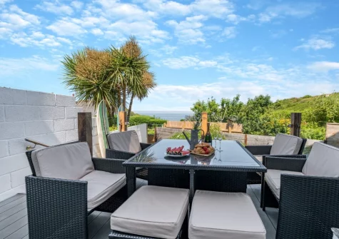The decked patio, barbecue & alfresco dining area at Spring Cottage, Mortehoe