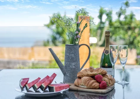 The decked patio, barbecue & alfresco dining area at Spring Cottage, Mortehoe