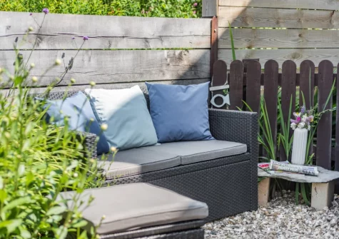 Steps down to the courtyard garden & outdoor sitting area at Spring Cottage, Mortehoe