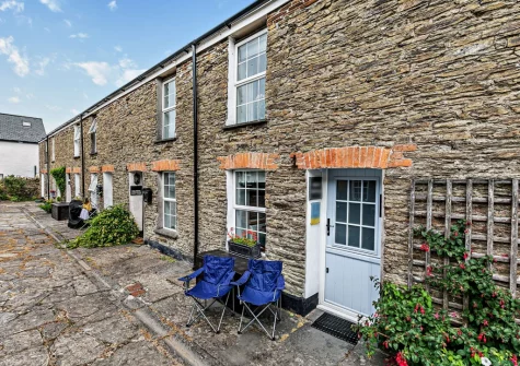 The large shared courtyard at Spring Cottage, Whitecross