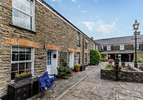 The large shared courtyard at Spring Cottage, Whitecross