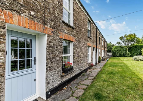 The shared grassed garden at Spring Cottage, Whitecross