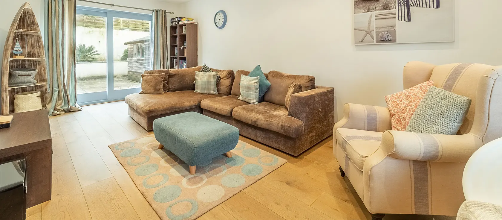 Spring Tide is a fantastic house just metres from Porthtowan Beach. This spacious property has an airy living room, statement kitchen, four comfortable bedrooms, three bathrooms and an enclosed patio with an outdoor shower and surfboard storage.