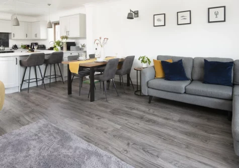St Andrews at Roserrow, Polzeath is a cosy two-bedroom cottage moments from Polzeath beach, offering a sunny private balcony with rolling countryside views, stylish open-plan living and easy access to Roserrow Estate's golf and leisure club.