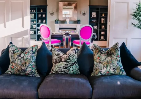 St Anne's Manor, Torquay is a magnificent Victorian mansion featuring five super-king bedrooms, private gymnasium, spectacular outdoor kitchen with pizza oven, hot tub, and three acres of private walled gardens creating luxury family escapes.