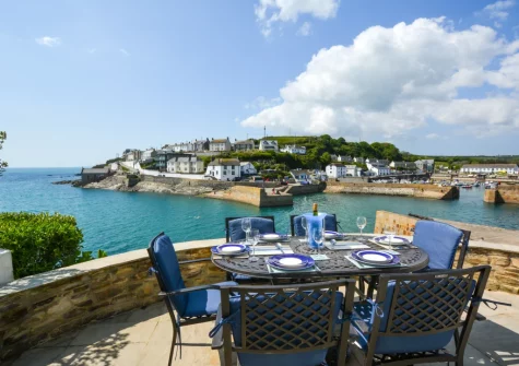 The patio & alfresco dining area at St Gwithians, 7 Bay View Terrace, Porthleven