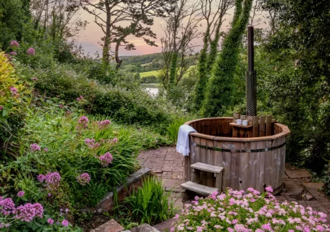 The wood-fire hot tub & garden at St Mary's, Little Petherick