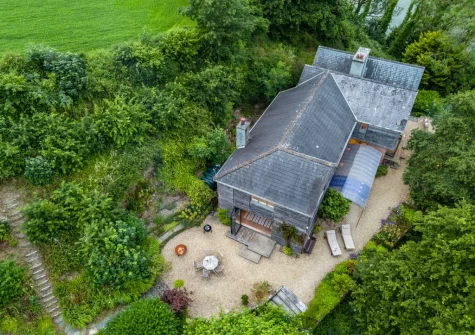 Boasting a splendid wrap-around space designed for relaxation & entertainment, St Mary's is a fantastic house nestled just above the creek that meanders into the River Camel