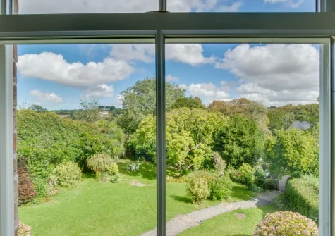 The view of the secluded garden from bedroom #1 at St Teresa's Cottage, St Mawgan