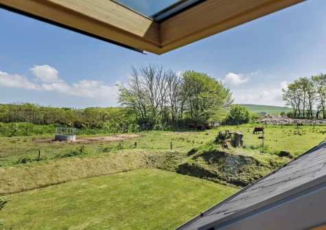 The countryside view from bedroom #1 at Stable Cottage, Challacombe