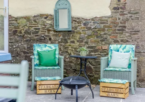 The patio & outdoor sitting area at Stargazey Barn, Buckland Brewer