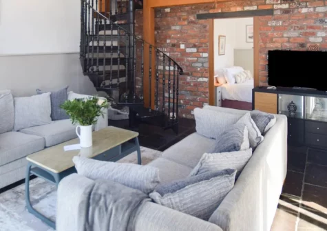 Stargazey Barn, Buckland Brewer is a beautifully converted one-bedroom barn with a private hot tub, glowing fire pit, and dog-friendly paddock. It's an idyllic North Devon countryside retreat for couples seeking space, peace, and fresh country air.