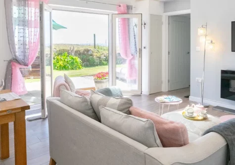 Stargazing Cottage, St Just, is a stylish one-bedroom retreat with a private hot tub, nestled in the heart of Cornwall's breathtaking Penwith Peninsula. With coastal paths on the doorstep and stunning attractions nearby, it's bliss for couples.