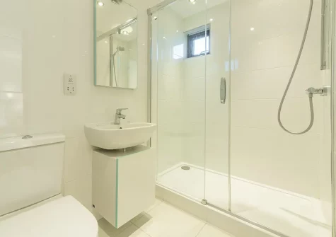 Bedroom #1 en-suite shower room at Stargazy, Morcliff Holiday Lodges, St Agnes