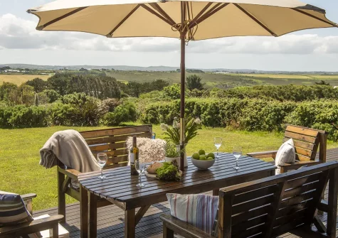 The decked patio, barbecue & alfresco dining area at Stargazy, Morcliff Holiday Lodges, St Agnes