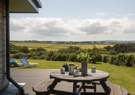 The decked patio, barbecue & alfresco dining area at Stargazy, Morcliff Holiday Lodges, St Agnes