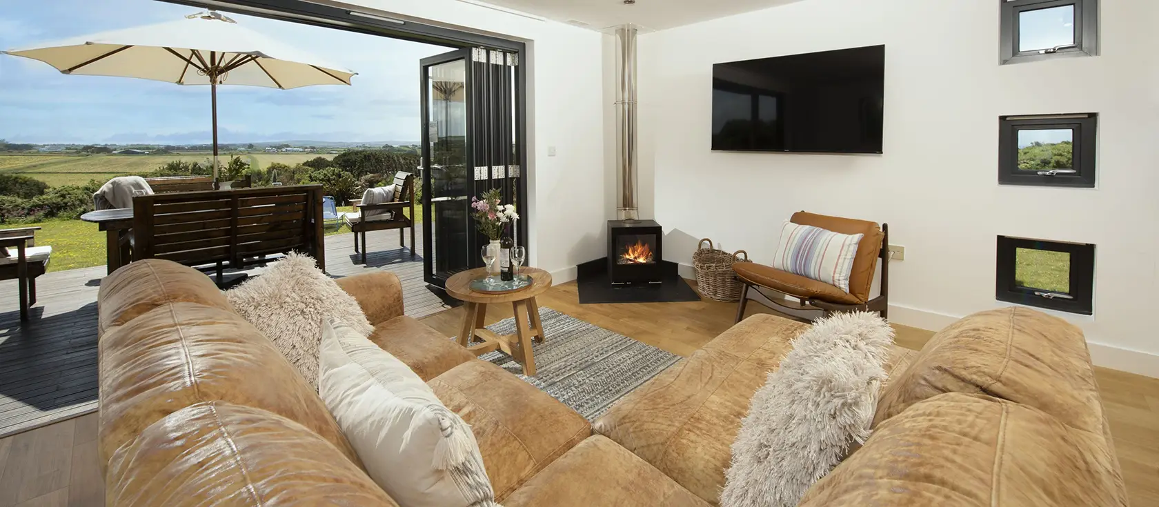 Stargazy, St Agnes is a stunning three-bedroom eco-lodge offering breathtaking countryside views and modern luxury. Enjoy contemporary comfort with wood-burner, private deck, and seamless access to coastal paths and Cornwall's treasures.