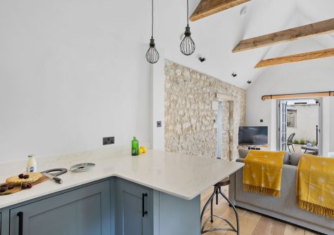 The kitchen & breakfast bar at Starre Barn Cottage, Beer