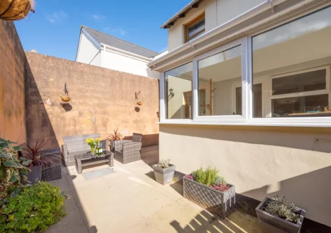 The enclosed patio & outdoor sitting area at Stepcott Cottage, Braunton
