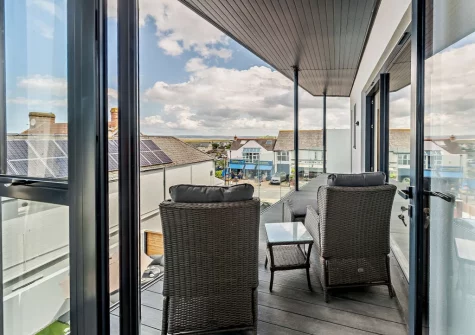 The balcony & outdoor sitting area at Stone Bay, Westward Ho!
