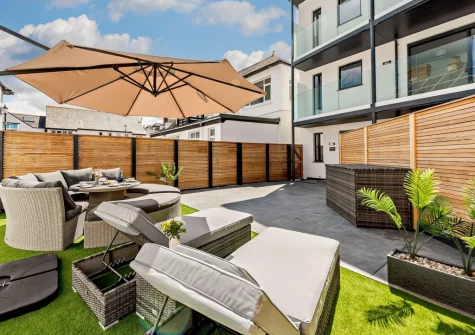 The enclosed courtyard garden & outdoor sitting area at Stone Bay, Westward Ho!