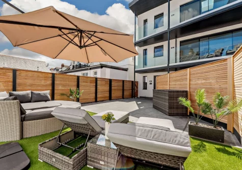 The enclosed courtyard garden & outdoor sitting area at Stone Bay, Westward Ho!