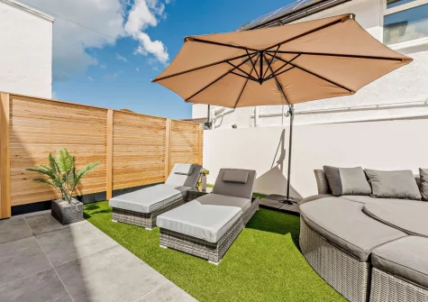 The enclosed courtyard garden & outdoor sitting area at Stone Bay, Westward Ho!