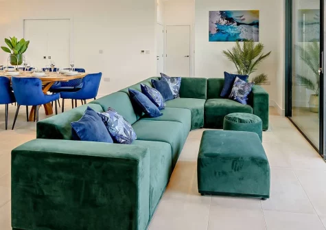 Stone Bay, Westward Ho! is a beautifully presented contemporary apartment with fantastic sea views from its top floor, with two balconies, a private courtyard garden, flexible six-bedroom accommodation, & the town's golden sands nearby.