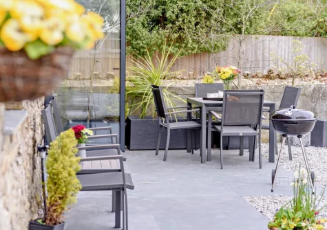 The patio, barbecue & alfresco dining area at Stonehaven at Woolmers House, Bickington