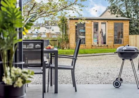 The patio, barbecue & alfresco dining area at Stonehaven at Woolmers House, Bickington