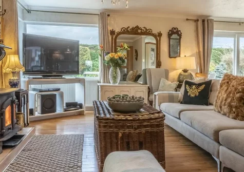 Stonewold, Buckland Brewer is a spacious six-bedroom retreat perfect for large families and group gatherings, offering a private hot tub, sauna, games room, and extensive grounds with children's play equipment for endless outdoor adventure.