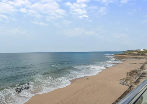 The far reaching sea view from the sunroom balcony at Stormgazer, Porthleven