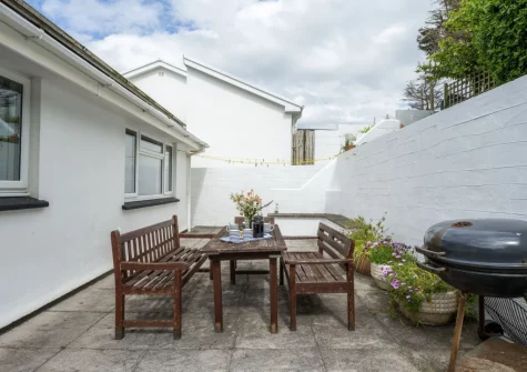 The enclosed rear patio, barbecue & alfresco dining area at Stradav, Polzeath