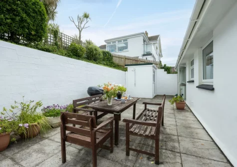 The enclosed rear patio, barbecue & alfresco dining area at Stradav, Polzeath