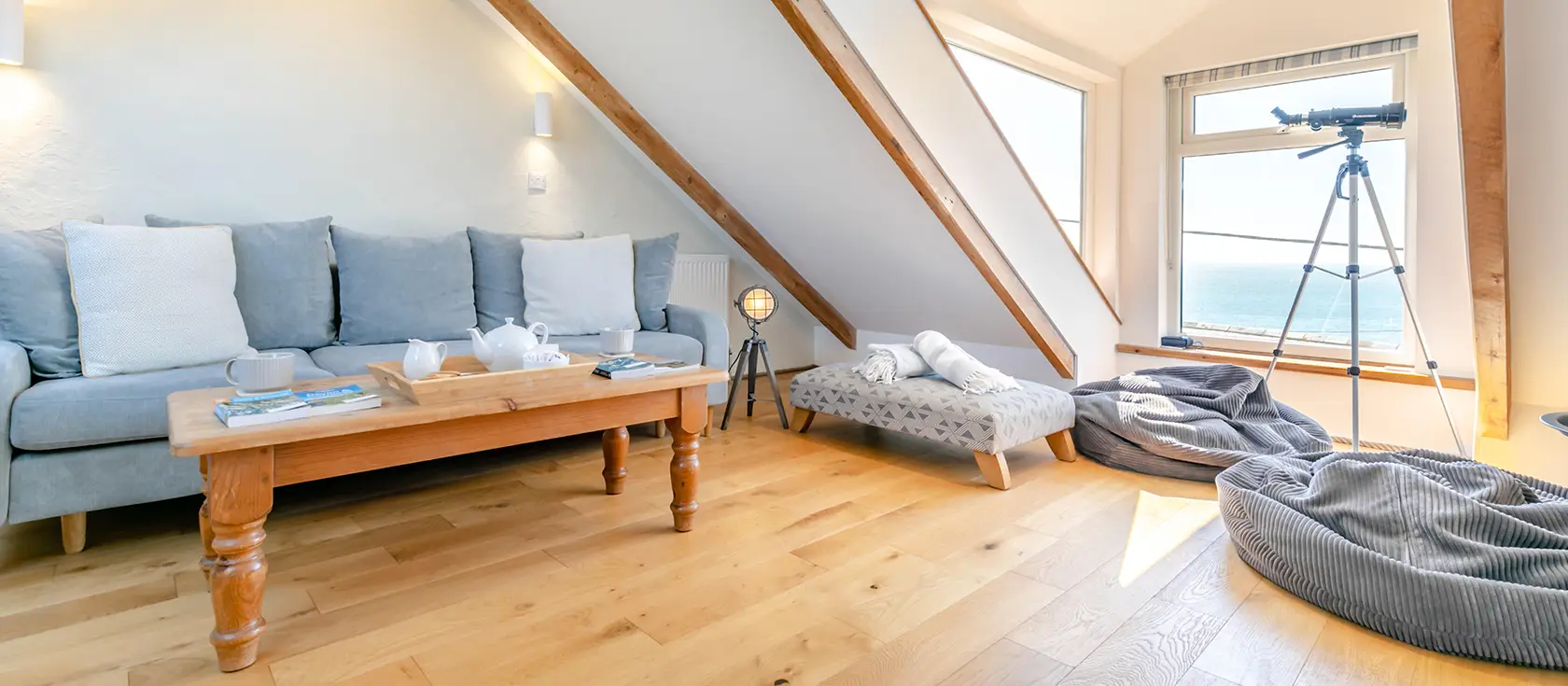 Suffolk Cottage, Porthleven is a charming 2-bedroom traditional retreat blending original Cornish character with modern comforts. Enjoy stunning sea views from the spectacular attic room, enclosed patio dining, and prime harbour location.