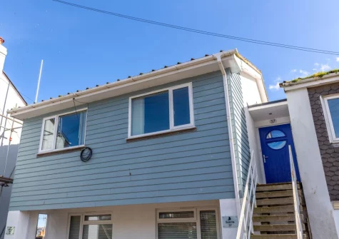 Sulima is a stunning second floor apartment in Brixham with glass-fronted private balcony & private off-road parking for one car