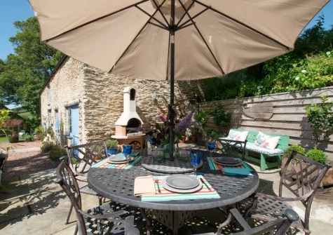 The patio, barbecue & alfresco dining area at Summercombe, Berrynarbor