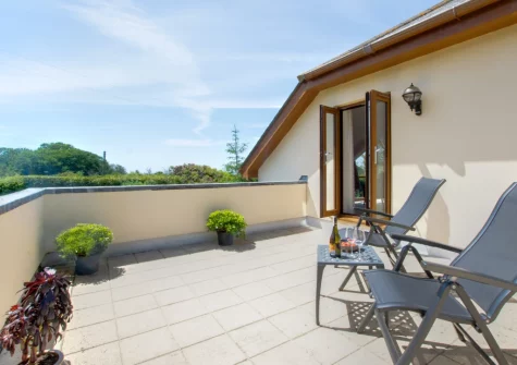 Bedroom #1 balcony & outdoor sitting area at Sundance, Ashton